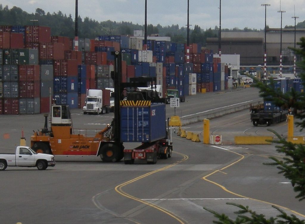 Shipping containers and freight vehicles at Terminal 5 in Seattle