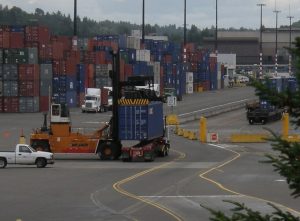 Shipping containers and freight vehicles at Terminal 5 in Seattle