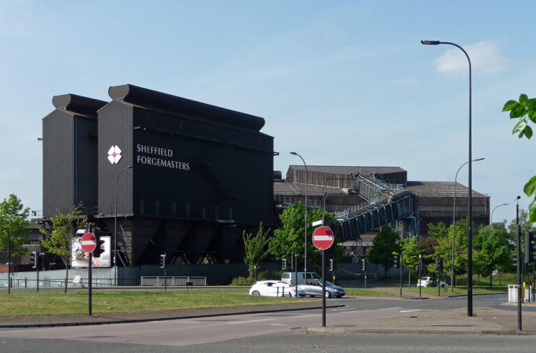 Exterior of the Sheffield Forgemasters steelworks beside a road